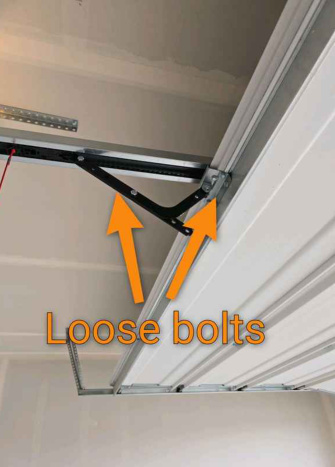 Loose garage door hardware identified during inspection