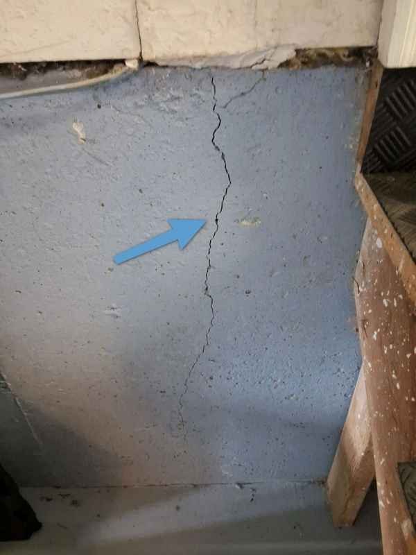Minor foundation cracking documented for monitoring during inspection
