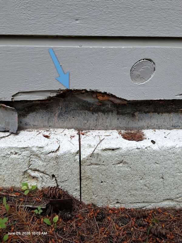 Siding clearance and exterior deterioration indicators documented during inspection
