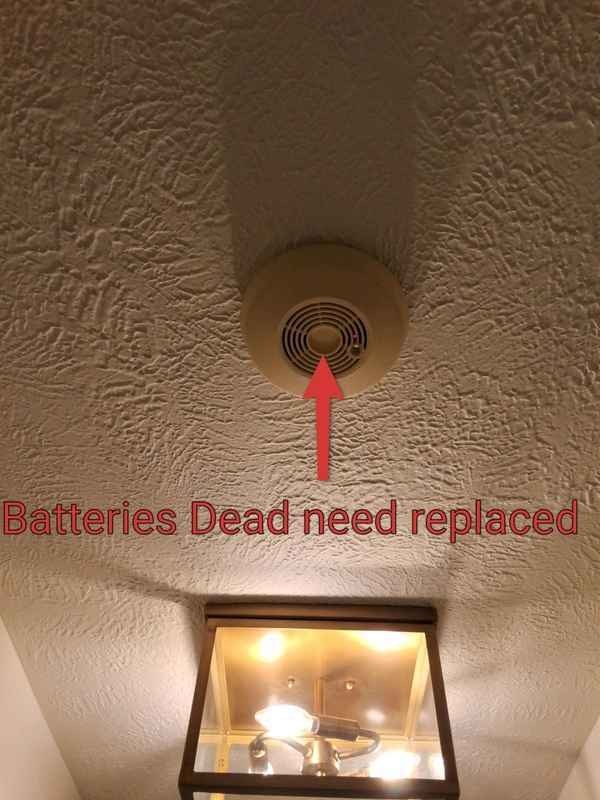 Smoke alarm battery safety finding documented during inspection