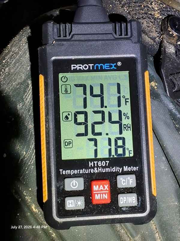 Humidity meter showing relative humidity in the low 90 percent range in a flooded crawlspace